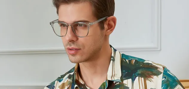 Man in colourful shirt wearing glasses