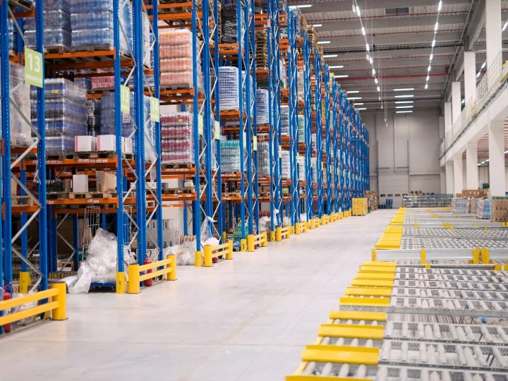 Warehouse storage interior with shelves loaded with goods