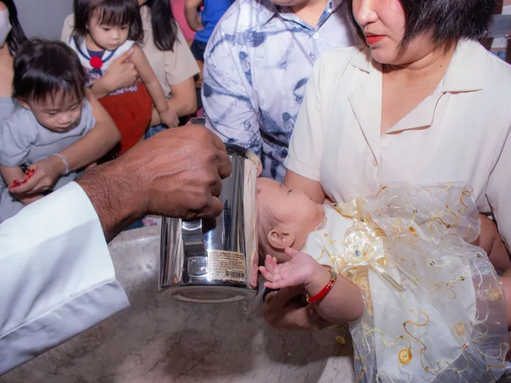 A family gathered for a baptism