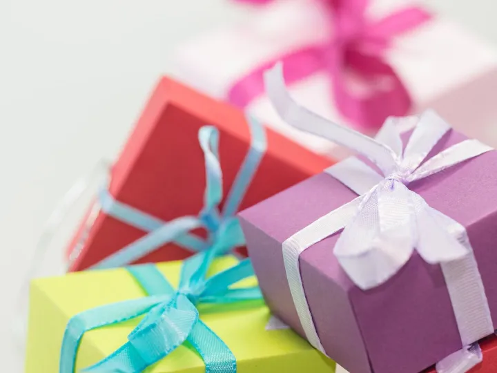 Close-up of vibrant gift boxes with ribbons