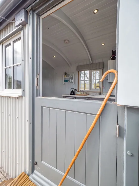 The stable door of the Shepherd’s Crook open to the countryside