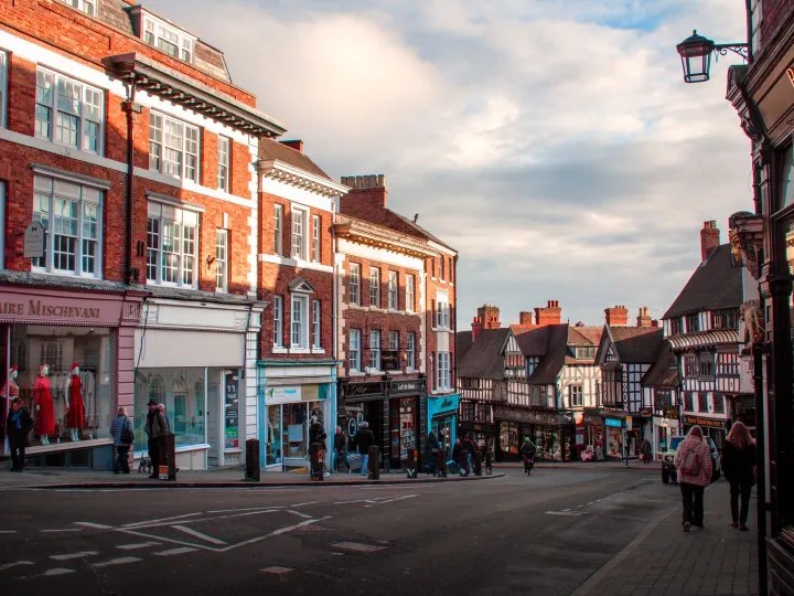 A view along a historic Shrewsbury street in afternoon sunshine