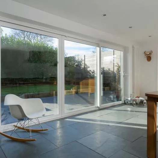 uPVC patio door with a white chair