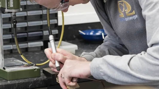 Technician repairing glasses