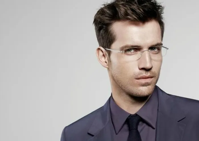 Man wearing rimless glasses