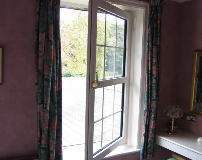 Casement window in a purple room