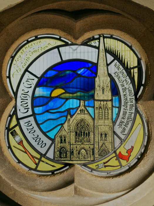 George Cox window with church
