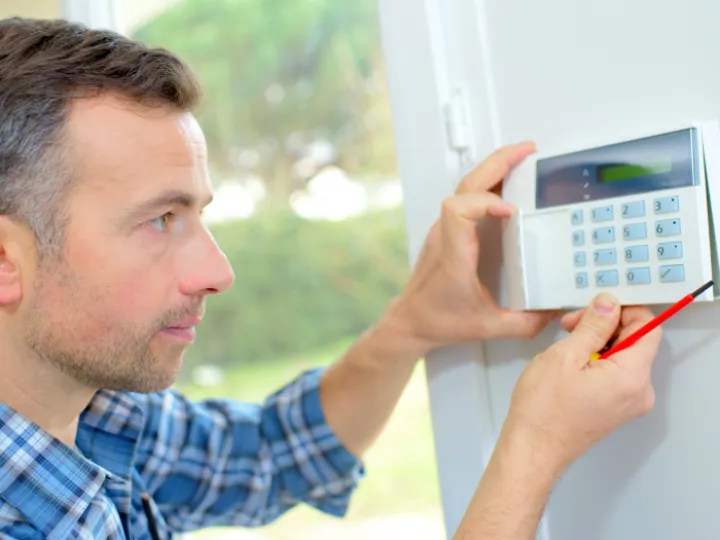 Engineer assembles control panel