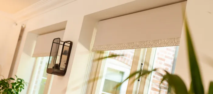 Peach blinds on peach wall