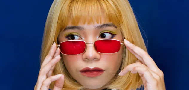 Woman in red retro glasses