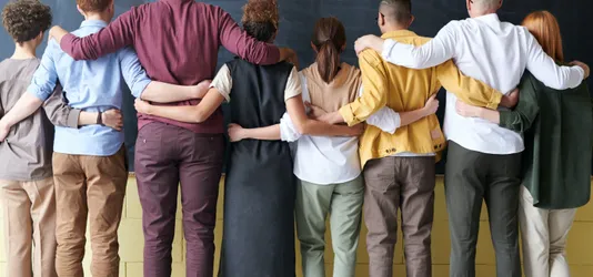 Group of People Standing Indoors