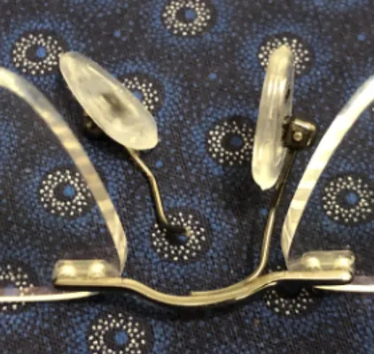 Broken nose pad on glasses