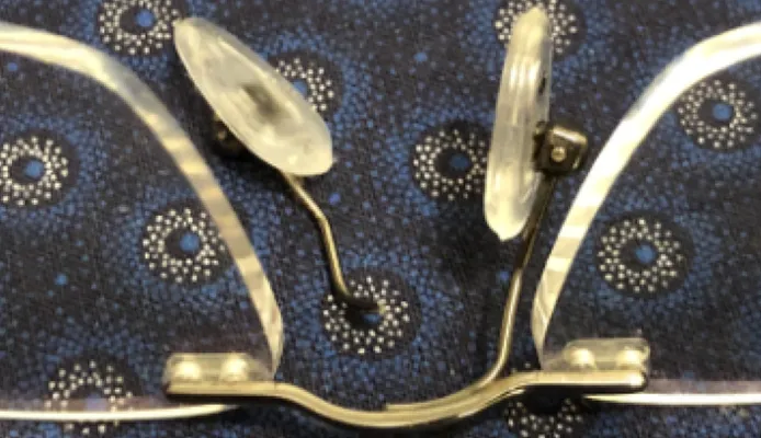Broken nose pad on glasses