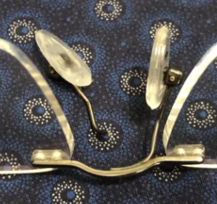 Broken nose pad on glasses