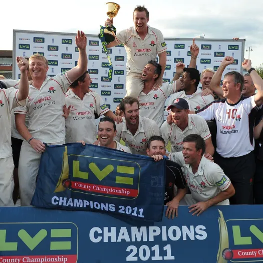 Cricket – LV County Championship – Somerset vs. LancashireThe Lancashire team celebrate with the Championship trophy at the County Ground, Taunton