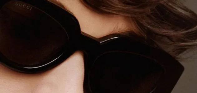 Woman wearing Gucci sunglasses
