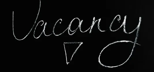 Vacancy Lettering Text on Black Background