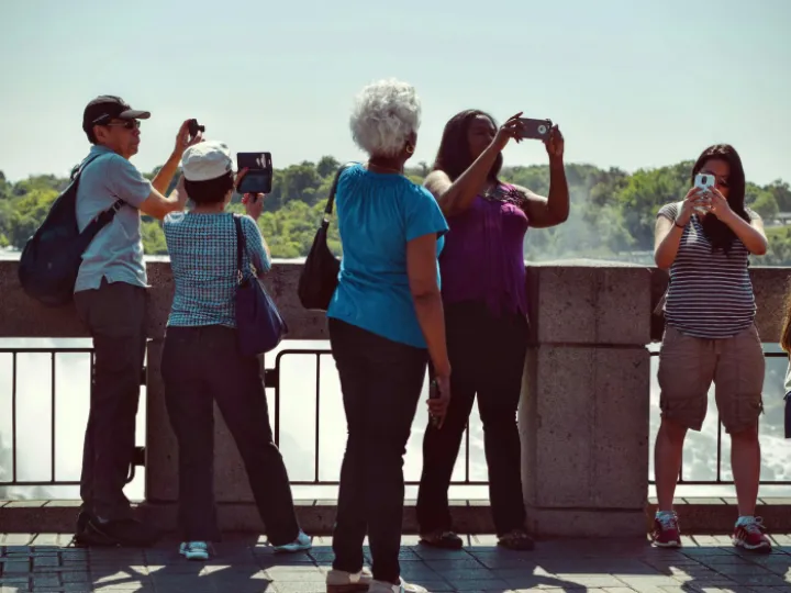 People Taking Pictures during Daytime