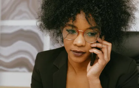 African American businesswoman in office, focused