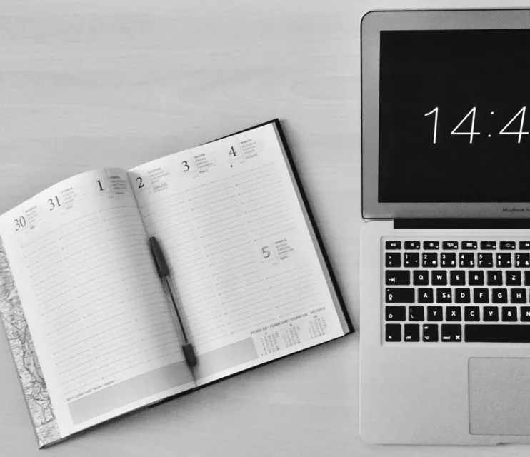 Minimalist office workspace with a notebook and