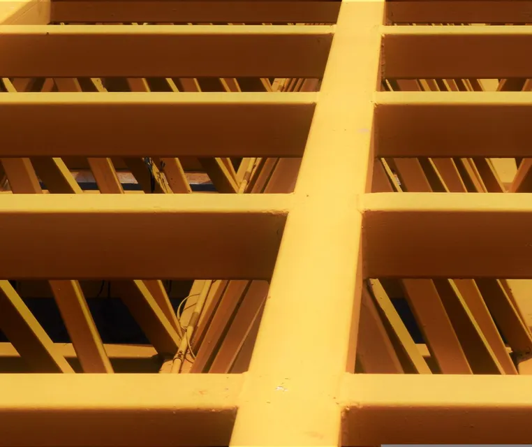 Yellow painted steel girders