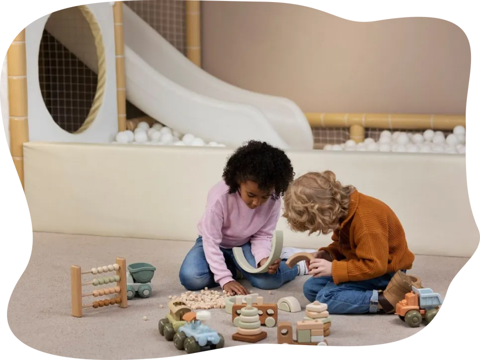 Full shot kids playing with eco toys indoors