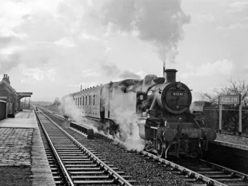 Ivatt 2 2-6-2T 41241 (a former Bath Green Park Loco) leaves Audlem with the 10.08 Wellington – Crewe service, 30/12/60. www.railphotoprints.co.uk – Hugh Ballantyne
