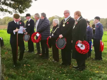 Local dignitaries waiting to lay wreaths in respect