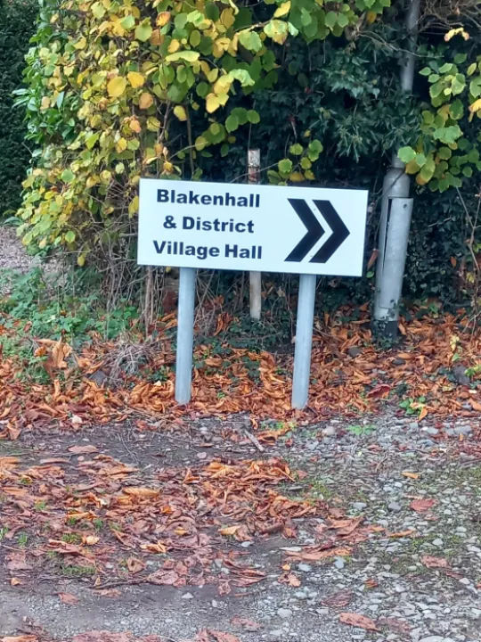 Sign pointing the way to Blakenhall and District Village Hall