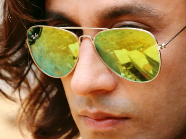 Man wearing Ray-Ban sunglasses