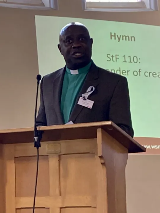 Revd Paul Nzacahayo leads opening devotions