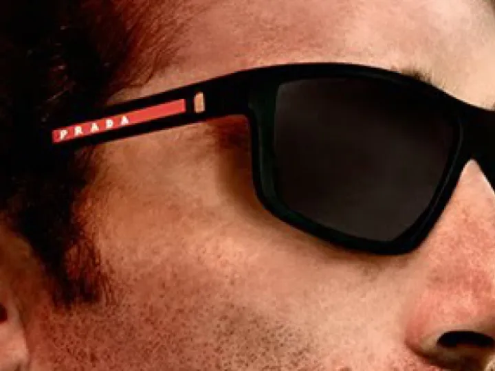 Man wearing Prada sunglasses
