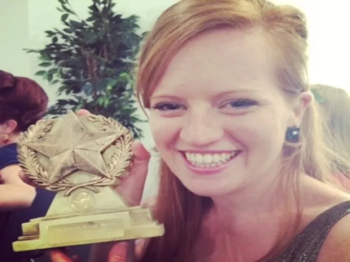 Alexandra Vintage holding trophy