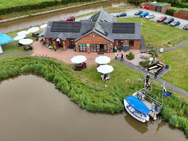 Audlem Lass offloads passengers at Overwater Marina and Cafe at Bridge 80