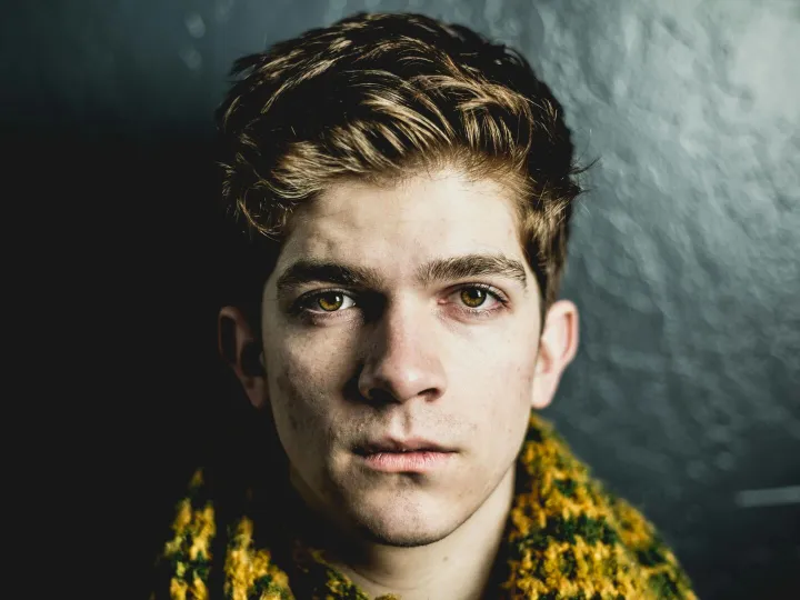 Close-up portrait of a young adult male with a