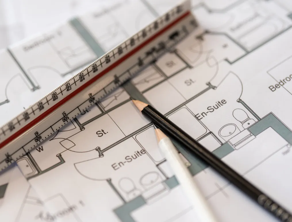 Architect plans with pencil