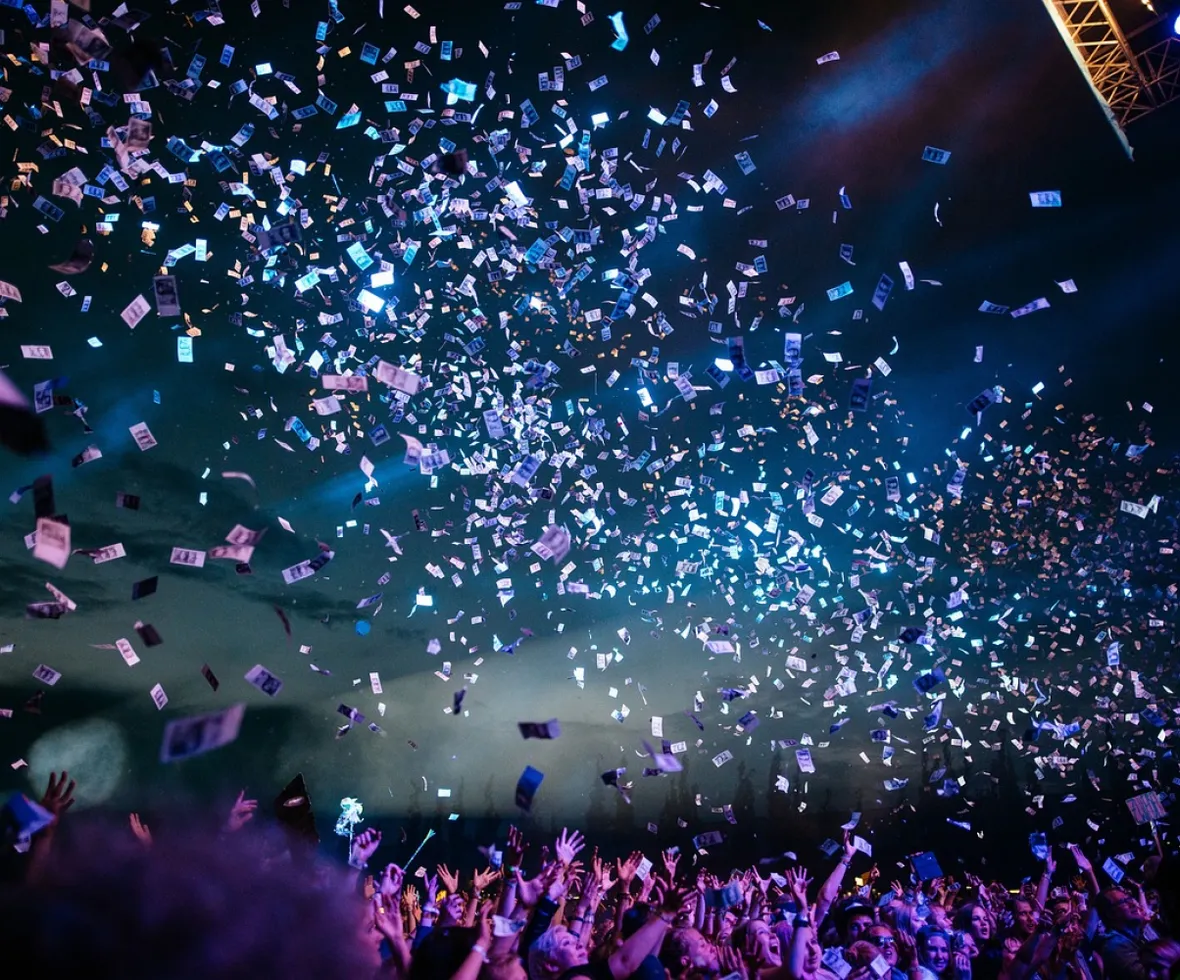 Confetti cascading down during a rock concert