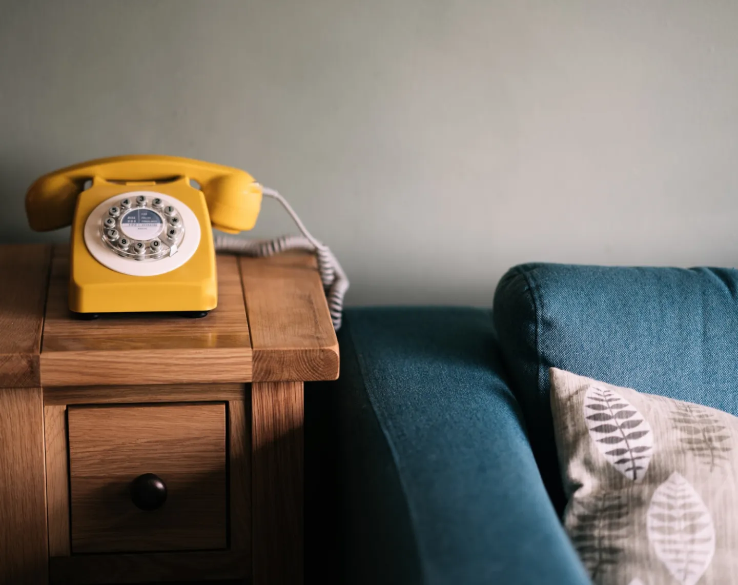 Yellow phone on a table