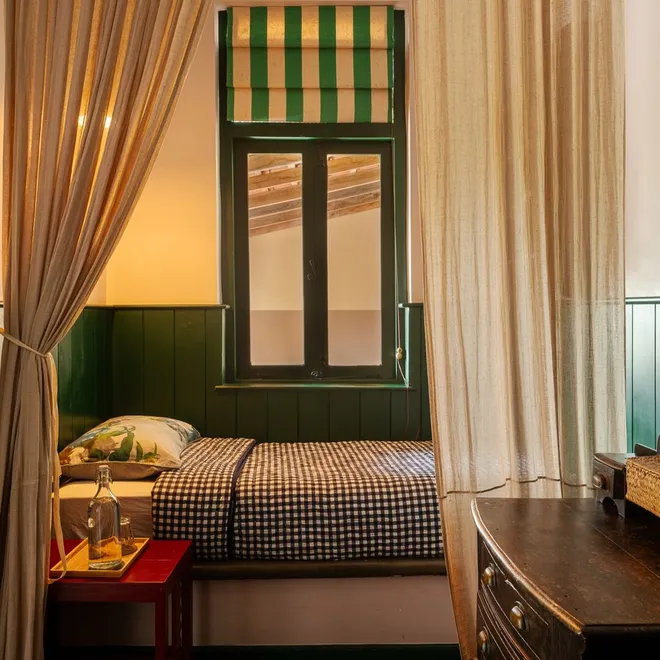 The second bed and dressing mirror in the Sigiriya View Suite at Peacock Hill Sigiriya