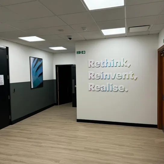 n office wall decorated with inspiring slogans.