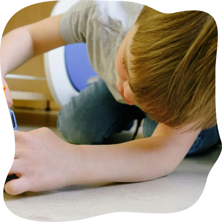 A child engaged in imaginative play with toy