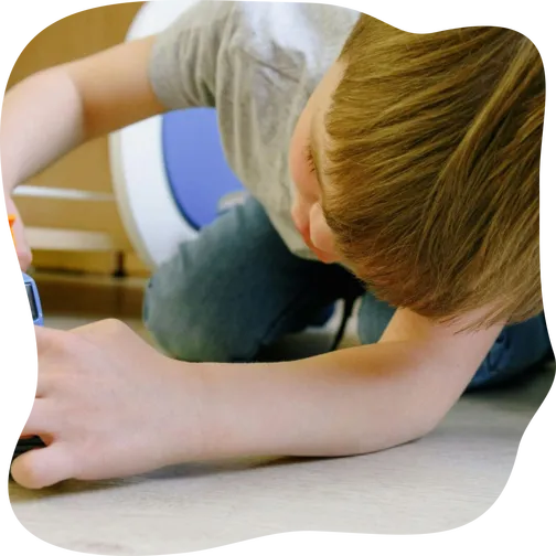 A child engaged in imaginative play with toy