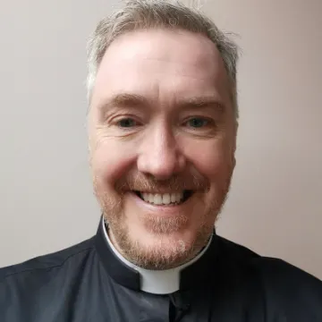 Rev Mark Carrick