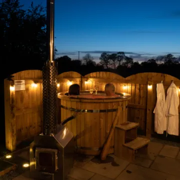Overwater Luxury Glamping Hodnet Hot Tub at Night 5