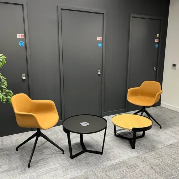Informal chairs and tables at QBE Manchester offices