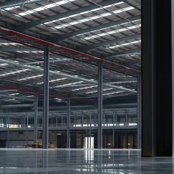 Goods stacked in a newly painted warehouse