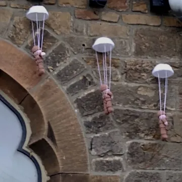 Etherley Parachutes Outside Church