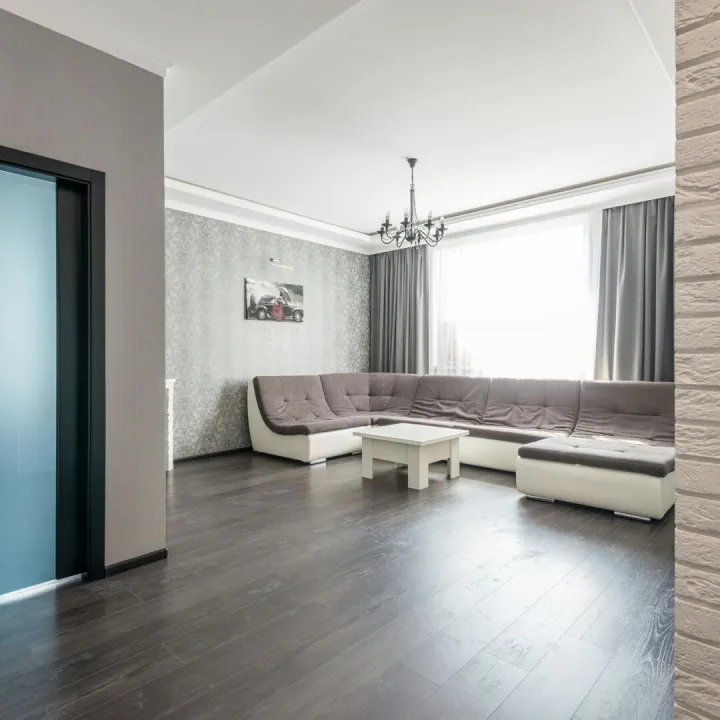 View of empty spacious living room with wooden