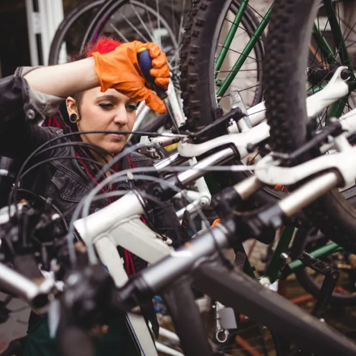Mechanic repairing a bicycle
