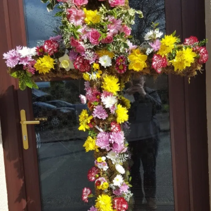 Easter 16 Cross with flowers outside Church